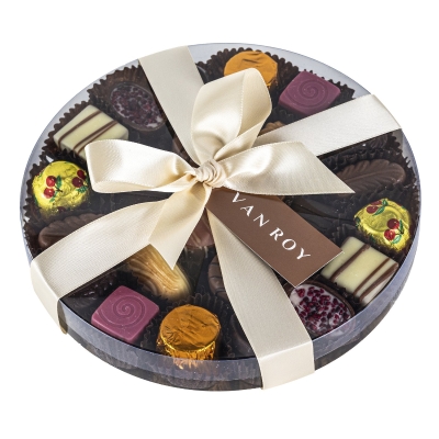 Assorted Belgian chocolates in 18cm clear round with ribbon  315g