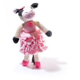 Cow in pink frill dress